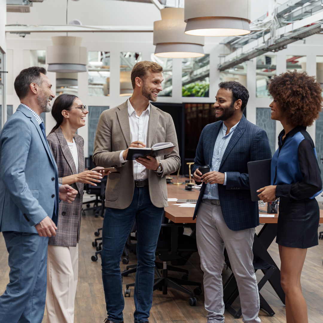 Gap Cover: The Ultimate Employee Benefit for South African Businesses South African employees reviewing healthcare benefits with HR representative.